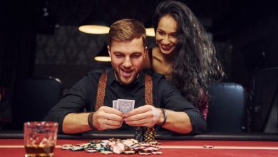 A happy couple exploring casino bonus offers