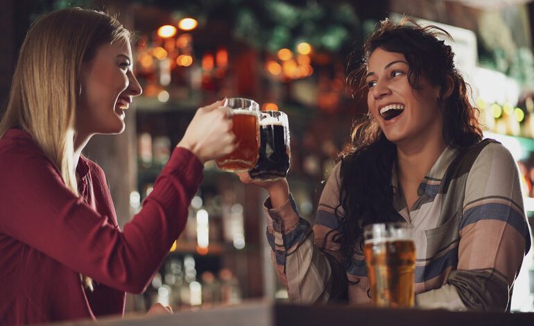 Lesbian enjoying beers in dating and building connections