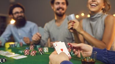 A group of friends enjoying a casino night with cards and beer in Canada