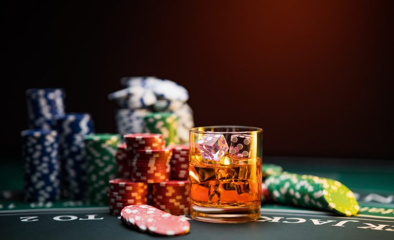 Gambling chips and beer, representing the experience of crypto gamblers