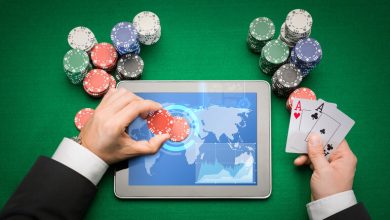 Casino poker player with cards, tablet, and chips, representing gambling trends in Thailand