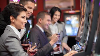 People enjoying craft beers while playing slot machines at a casino