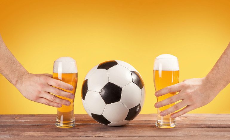 Two glasses of beer produced by a sport-inspired brewery