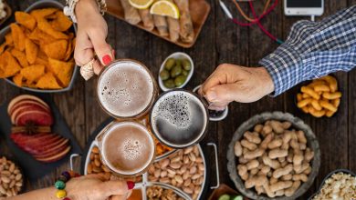 People are enjoying expertly matched craft beers and dishes in a vibrant social setting in San Diego