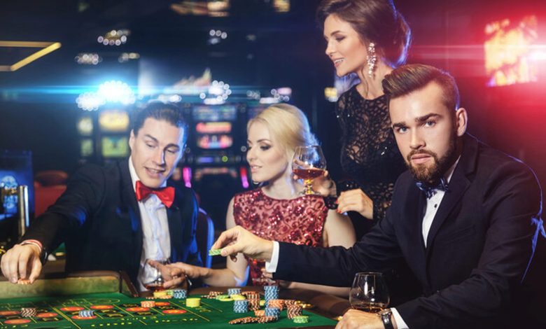 People enjoying a gambling game in a casino setting
