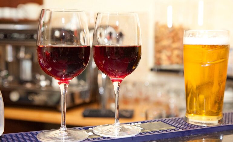 Mobile beer trailer setup with red wine and craft beer served at an event