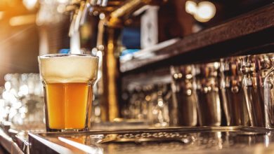 Freshly poured craft beer on tap at a San Diego brewery bar, showcasing the city’s vibrant beer culture