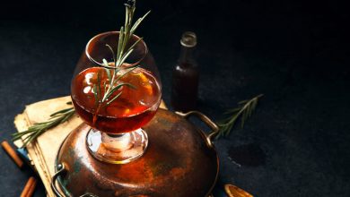 A glass of Red Spot Irish Whisky garnished with rosemary