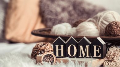 Cozy home decor setup with wooden letters spelling "HOME."