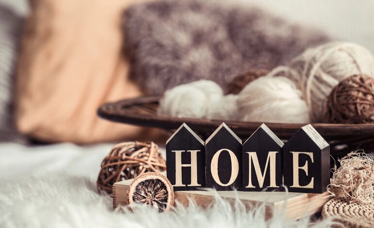 Cozy home decor setup with wooden letters spelling "HOME."