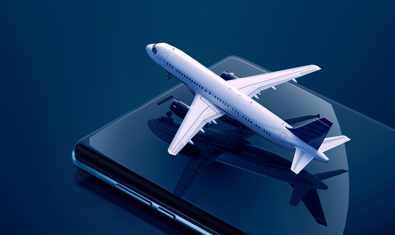 Airplane model emerging from smartphone screen