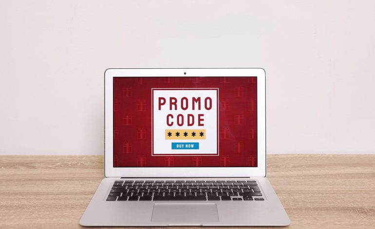 Open laptop displaying a promo code screen related to esports betting offers in Mongolia.