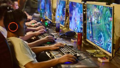 Esports players competing in a Southeast Asian gaming arena, highlighting the rise of competitive gaming culture popular among Filipino gamers.