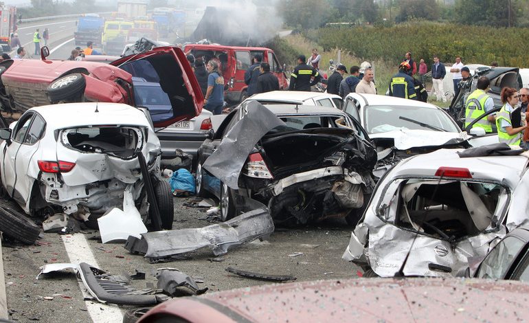 A multi-car accident on a highway.