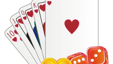 A set of casino cards, dice, and coins.