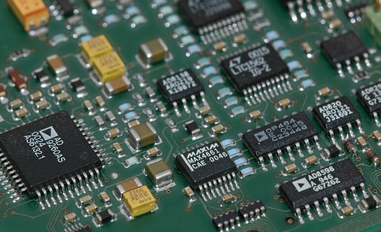 Close-up of a Rogers PCB with RF components and integrated circuits, highlighting high-frequency circuit design for advanced electronics.