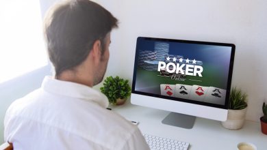 A man is playing online casino on a desktop computer.