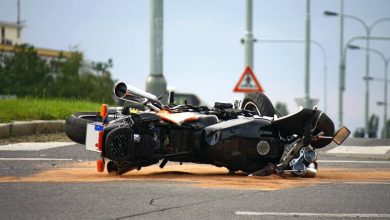 Motorcycle lying on its side after the road accident.