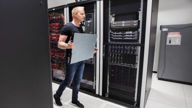 Technician installing server hardware in a data center, representing Century Tech System Pte Ltd as a wholesale supplier of quality server parts for beverage and other brands.