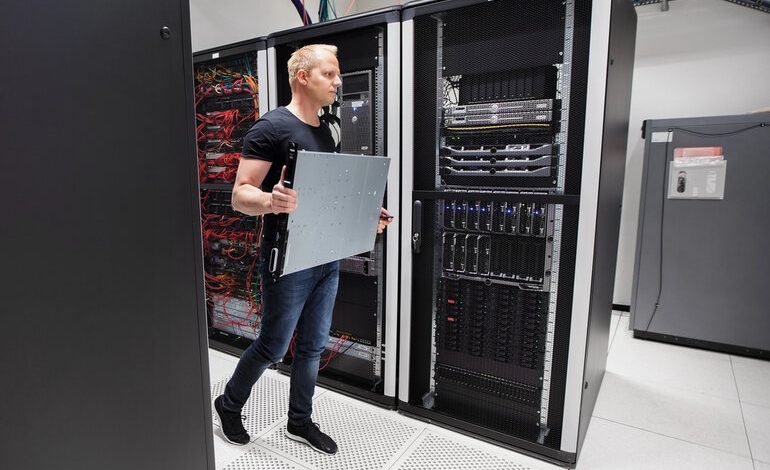 Technician installing server hardware in a data center, representing Century Tech System Pte Ltd as a wholesale supplier of quality server parts for beverage and other brands.