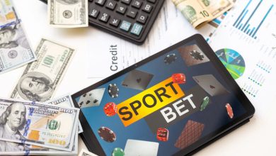 Tablet showing sports betting data with cash and charts, illustrating data-driven cricket betting.