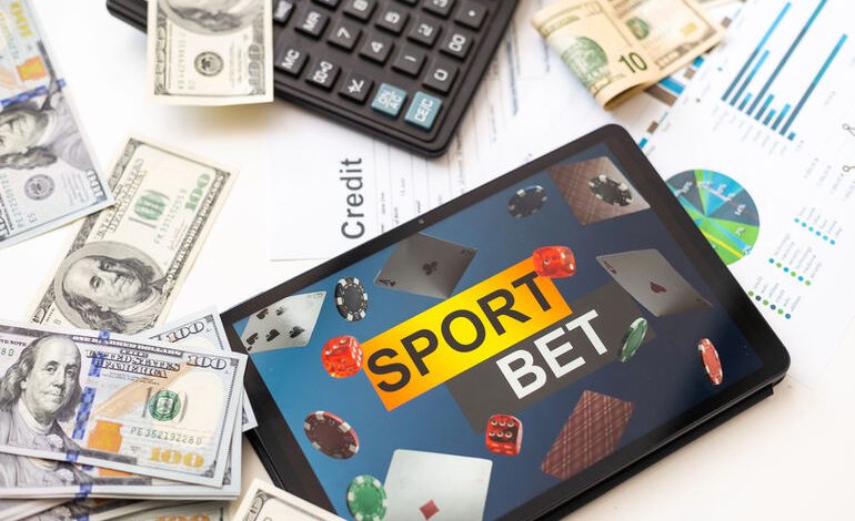 Tablet showing sports betting data with cash and charts, illustrating data-driven cricket betting.