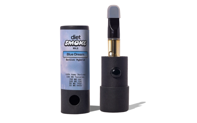 A vape cartridge and its cylindrical packaging labeled “diet smoke Blue Dream Sativa Hybrid,” showing hemp-derived ingredients and dosage details.