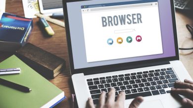 User working on a laptop with a web browser interface open.