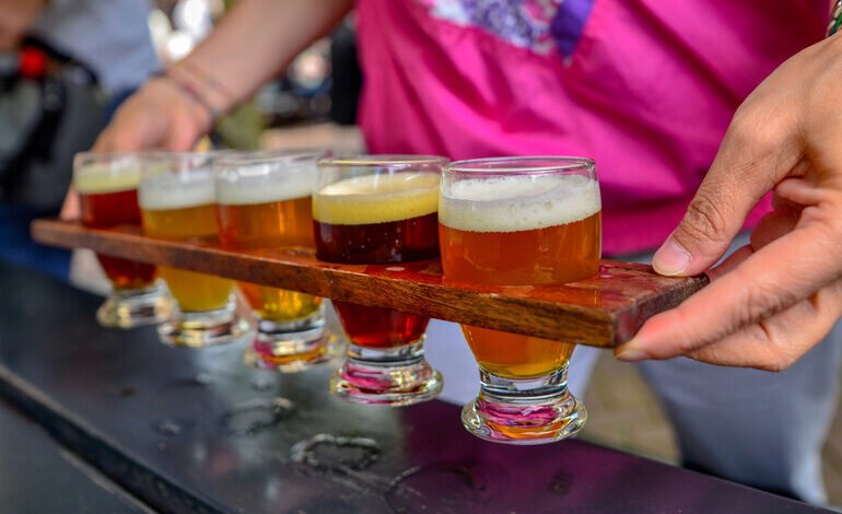 Craft beer flight featuring different beer styles for exploring beyond the IPA in San Diego.